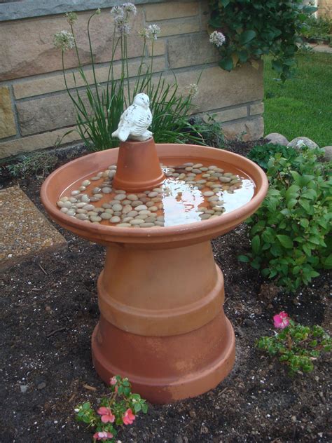Another DIY bird bath idea is a hanging bird bath using glass lids. Hanging bird baths are great for your balcony, backyard, or large tree branches in your garden. You can easily find glass lids on sale in thrift stores within your community. For this DIY bird bath, attach a chain to a glass lid (serving as a water basin). Once done, add some ...